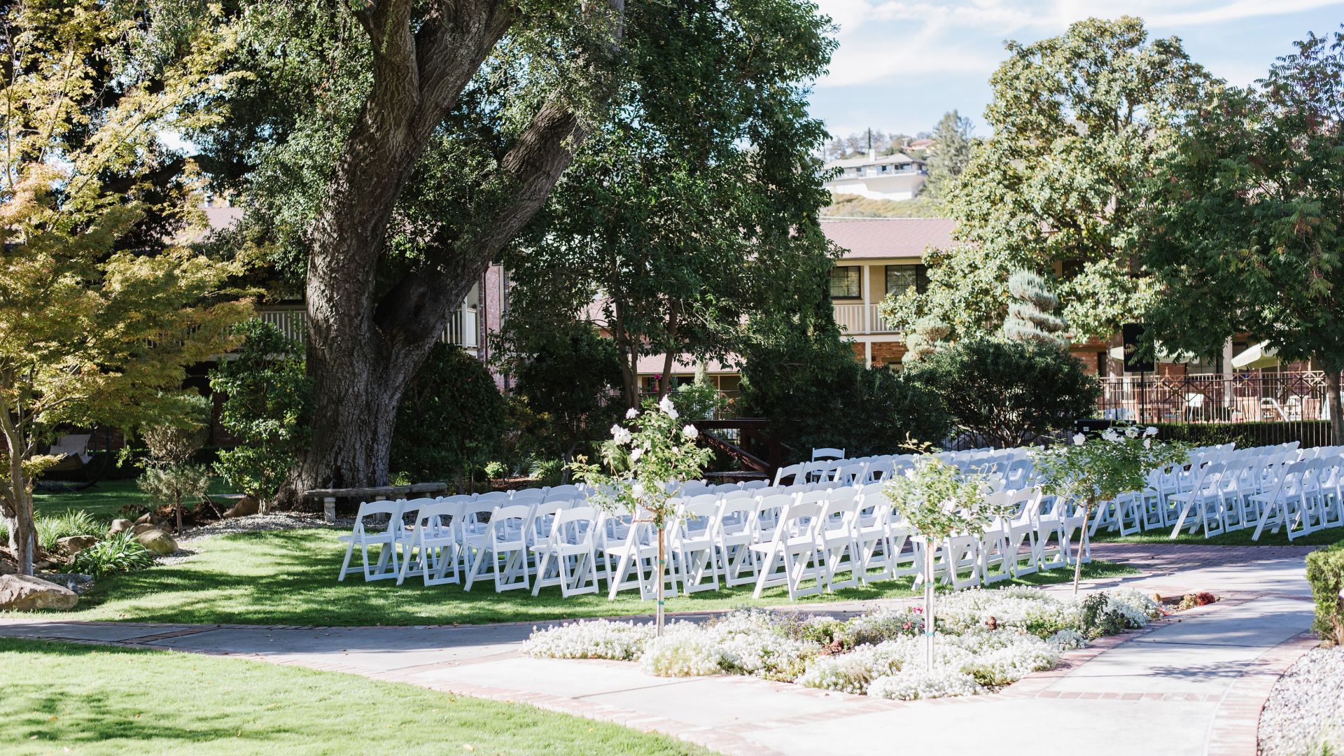 Outdoor garden wedding setup at Paso Robles Inn
